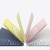 MacBook Air M2 color options - Midnight Yellow Pink Silver Starlight fanned display - official Apple colors