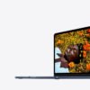 Midnight MacBook Air M2 Liquid Retina display showing vibrant orange poppy field - ultra-thin side profile